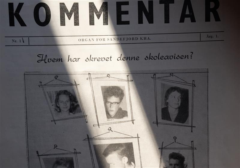 Faksimile fra skoleavis. Sort-hvitt-bilde av en ung Dag Solstad med buskete hår og briller.