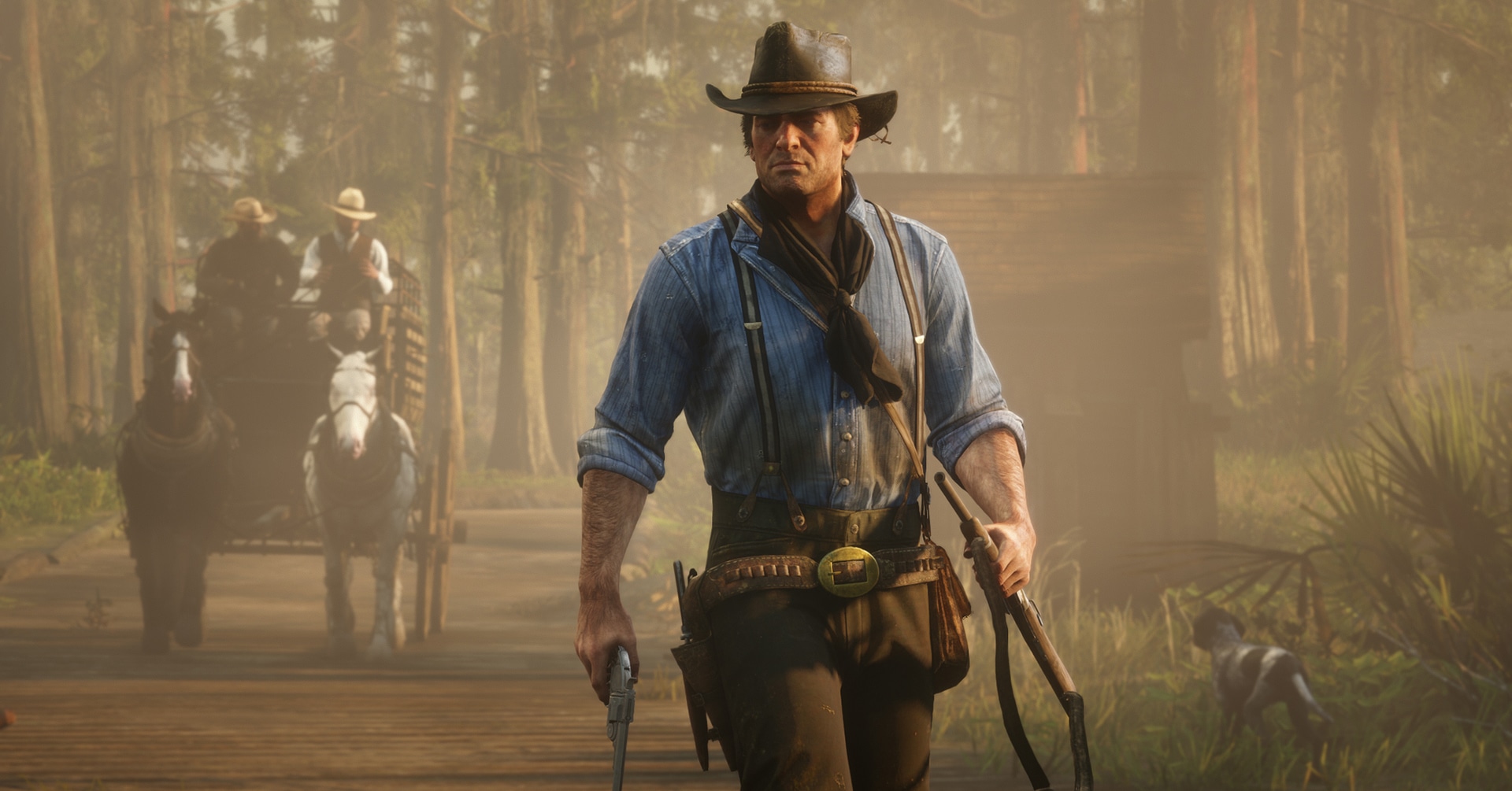 En mann i blå skjorte, cowboyhatt og flere våpen. Ser veldig hardbarka ut.